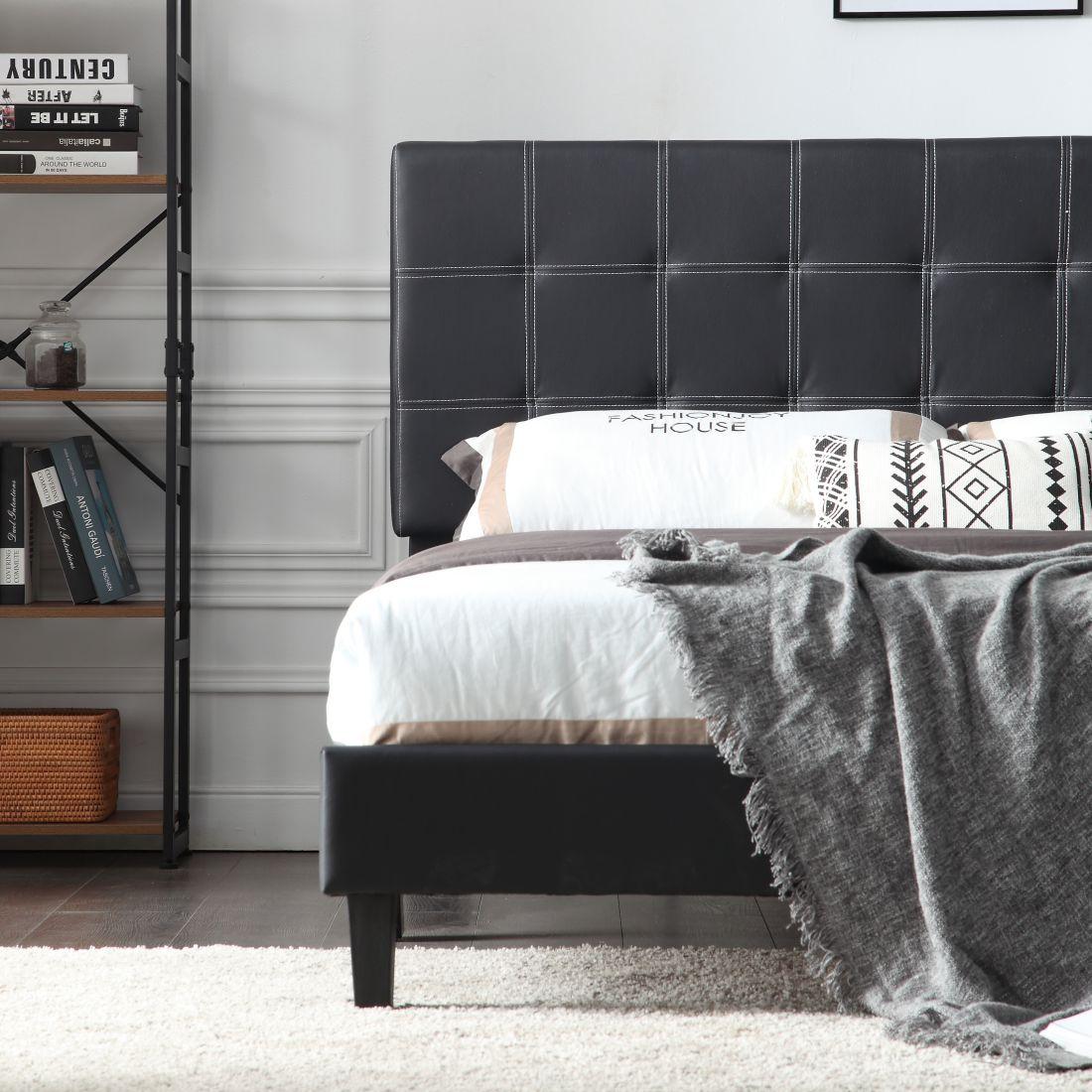 Todd Black Upholstered Bed
